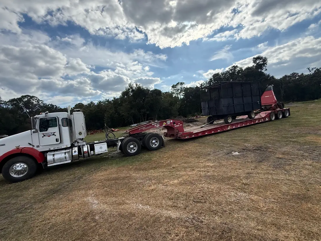 Farm equipment loaded on a trailer